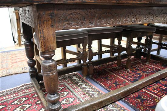 An oak refectory style dining table with cleated four-plank top, W.79cm L.210cm H.75cm